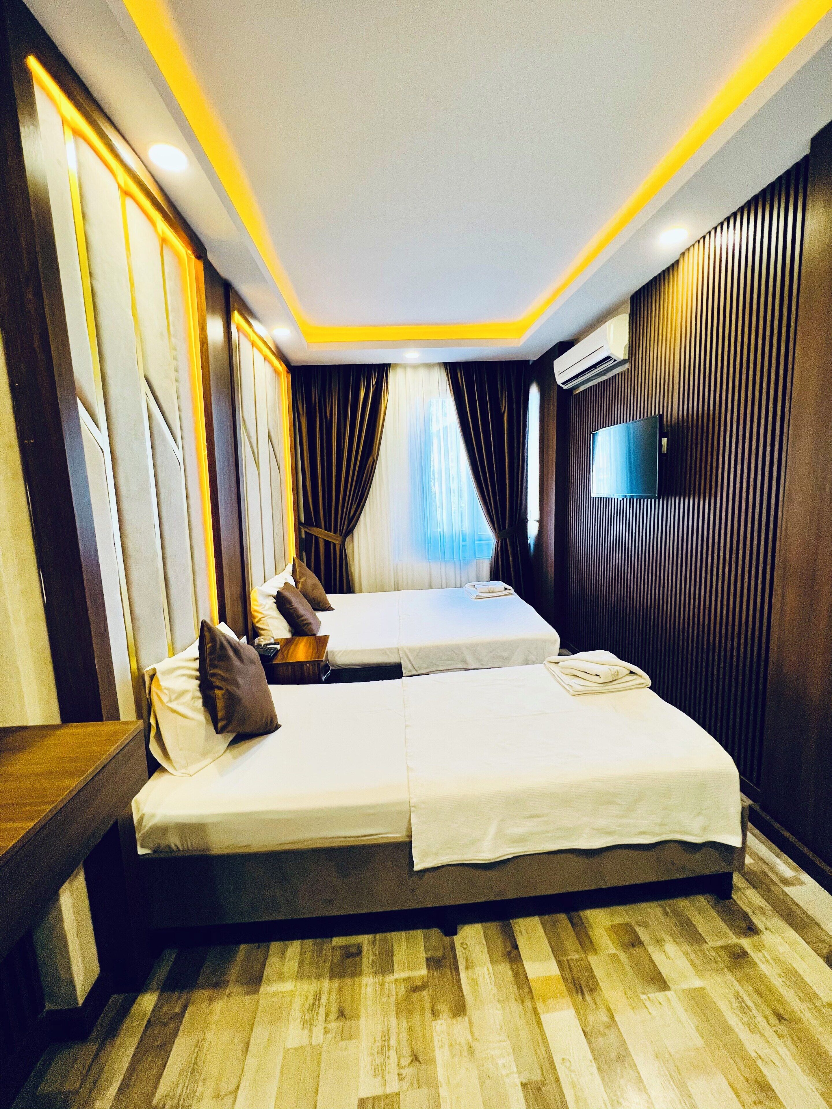 Standard Triple Room | Soundproofing, iron/ironing board, free WiFi