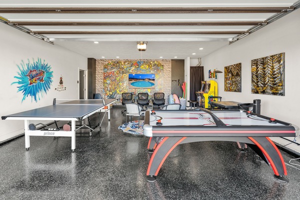 one of a kind recreation room. every kids dream room. ping pong, air hockey, free standing arcade games, even a 65" huge tv for Super Mario Brothers. Hours of fun in a temperature controlled room. Come see this unique play area.
