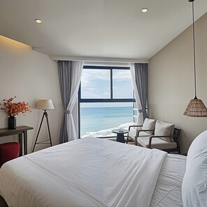 4 人部屋 クイーンベッド 2 台 ビーチビュー | 高級寝具、セーフティボックス (室内)、客室ごとに異なる装飾、客室ごとに異なるインテリア