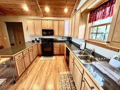 Escape to serene mountain bliss in this stunning mountain home.