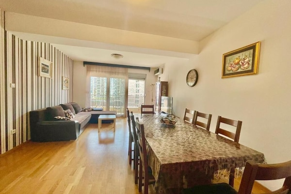 Comfort Apartment | Living area | 32-inch LCD TV with cable channels