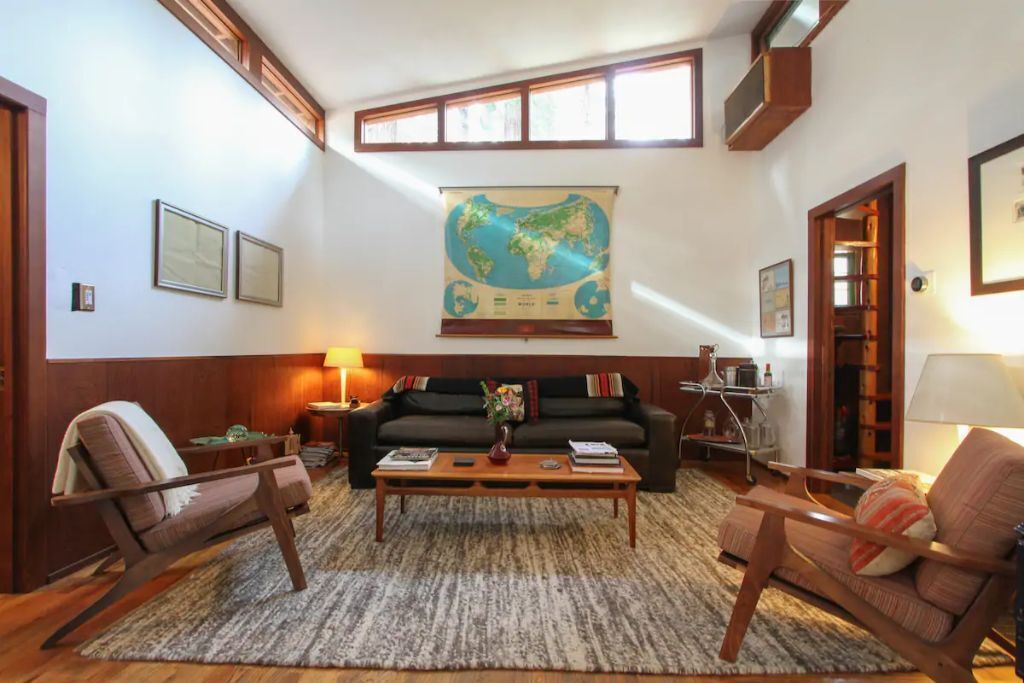 Beautiful handcrafted redwood home surrounded by decks and a hot tub with a view