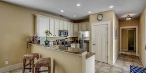 Fridge, microwave, oven, stovetop - Our 3 Bedroom Vacation Home w/ Amenities: Sleeps 8 (North Myrtle Beach)