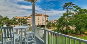 Outdoor dining - Premier Luxury Retreat with Dual Patio Decks (North Myrtle Beach)