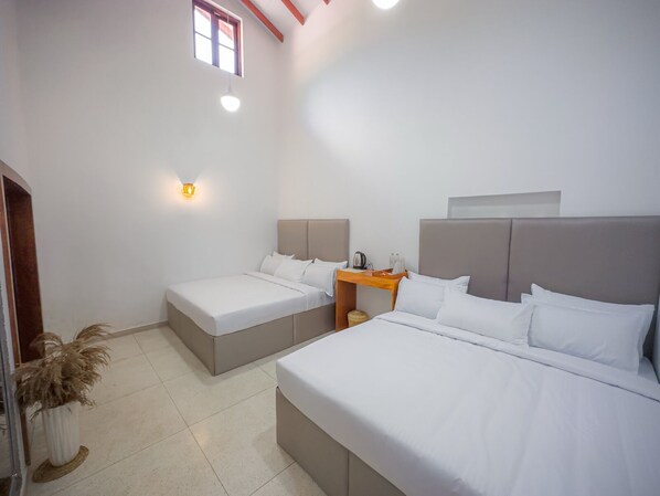 Family Room, Non Smoking | Select Comfort beds, in-room safe, individually decorated