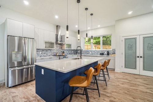 BRAND NEW Modern oasis in the heart of Atl! Perfect home for your family vacay