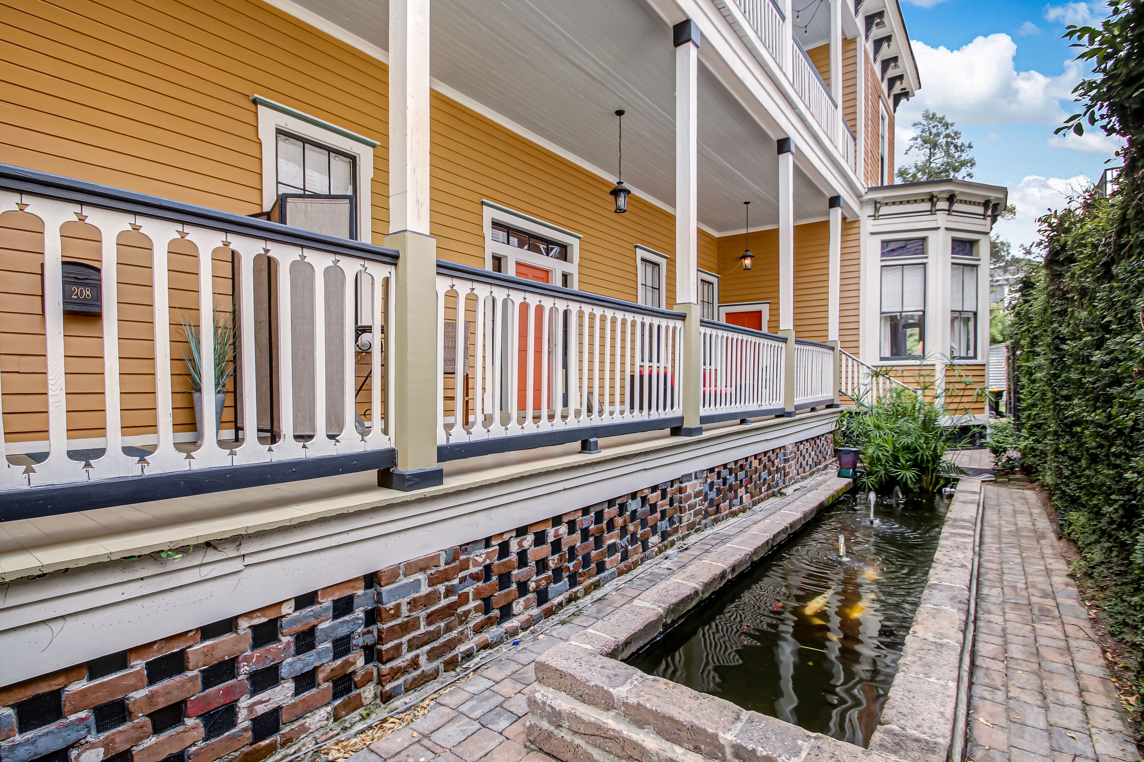 Victorian Style Manor w/ Incredible Outdoor Space + Parking by Lucky Savannah