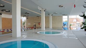 Indoor pool, open 6:00 AM to 10:00 PM, lifeguards on site