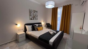 3 bedrooms, desk, iron/ironing board, travel crib - AXARA Modern Self-Catering Holiday House in Xaghra (Xaghra)