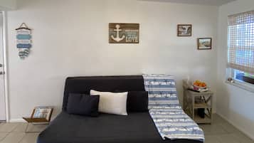 Smart TV, fireplace, foosball, books