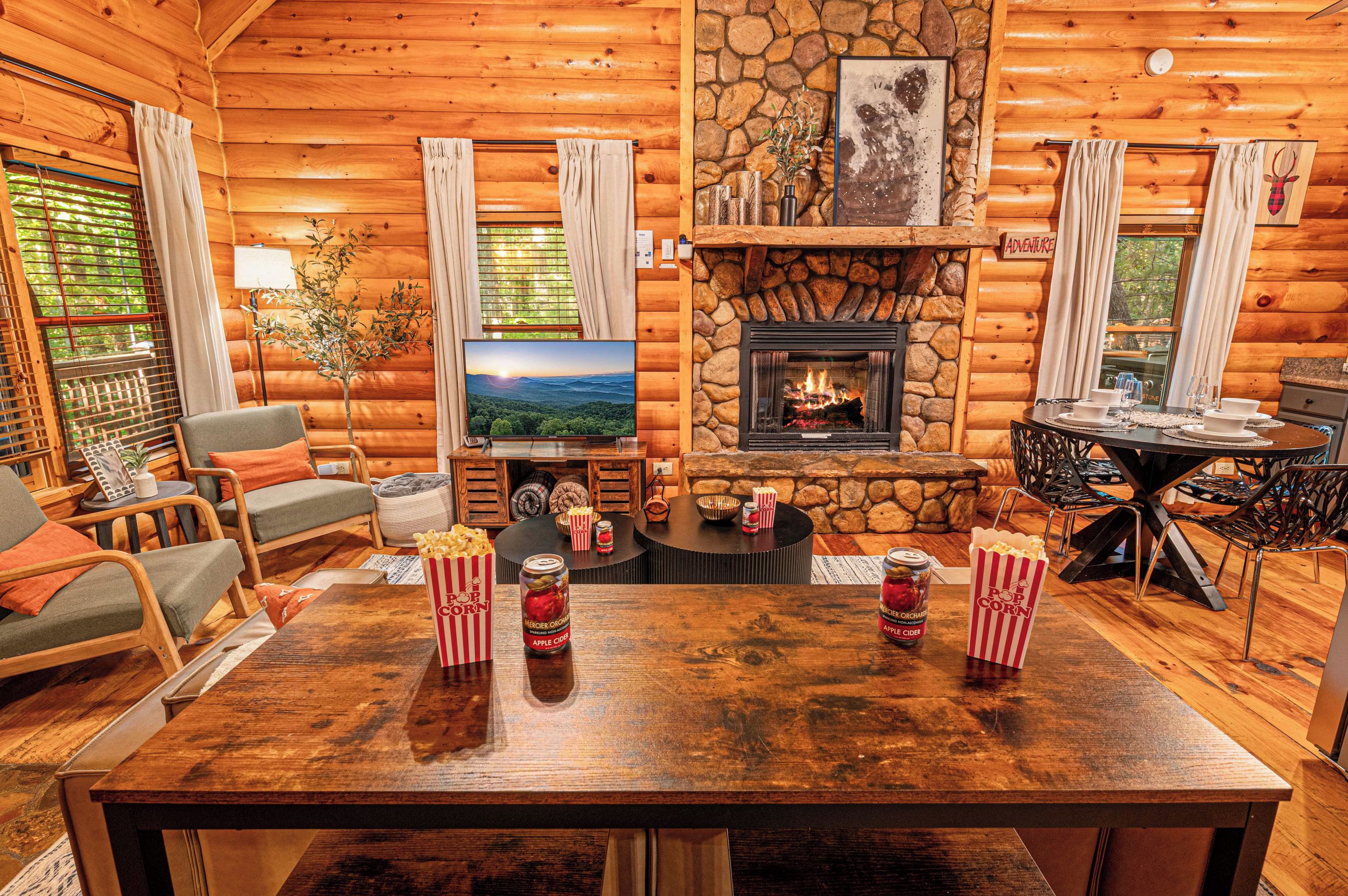 Pull a chair up to the table for popcorn and a movie. Fireplace going, the TV across the room, and the whole group within easy reach of the snacks.