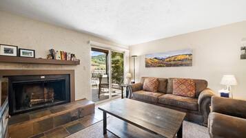 Smart TV, fireplace, books