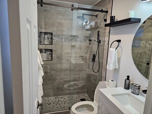 Hair dryer, towels, soap, shampoo