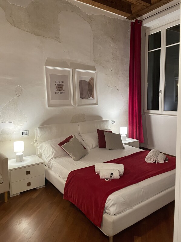 1 slaapkamer, een strijkplank/strijkijzer, wifi, beddengoed