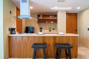 Luxury Suite, Multiple Beds | Private kitchen