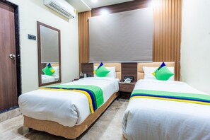 Standard Room | In-room safe, desk, iron/ironing board, bed sheets - Treebo City Center (Nagpur)