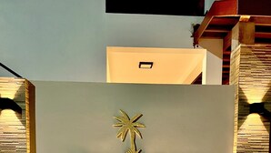 A sign with 'Villa Residence' and a palm tree logo, indicating a resort or hotel. - Vilu Residence (Maamigili)