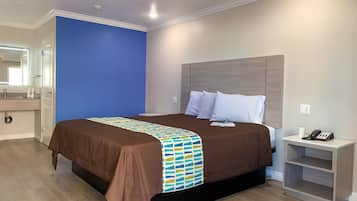 Comfort Room, 1 King Bed, Non Smoking | Desk, laptop workspace, iron/ironing board, free WiFi