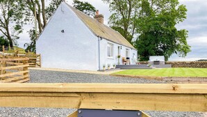 A cottage with a sign reading "South Ricketon Cottage". - South Riccalton Farm Cottage (Jedburgh)