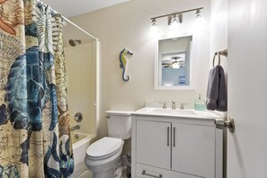 Hair dryer, towels, soap, shampoo - Latitude Adjustment-One block from the beach, shared pool, one dog allowed. (Fernandina Beach)