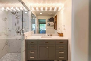 Shower, hair dryer, towels