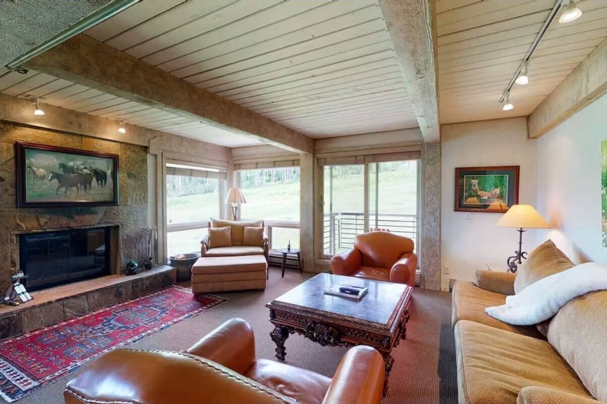 Standard Condo, 4 Bedrooms, Balcony, Mountain View (201) | Living area | 42-inch flat-screen TV with cable channels, fireplace