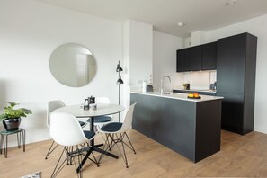 Appartement Affaires, 1 chambre | Repas dans la chambre