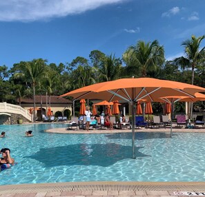 Outdoor pool, a heated pool - Stunning condo in beautiful TPC golf resort with large pool, spa and fitness (Naples)