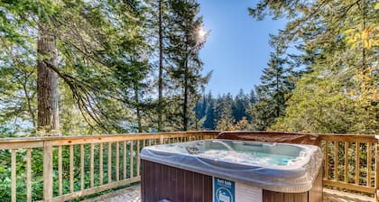 Dog-Friendly Home with Expansive Deck with Hot Tub and Dock on Woahink Lake