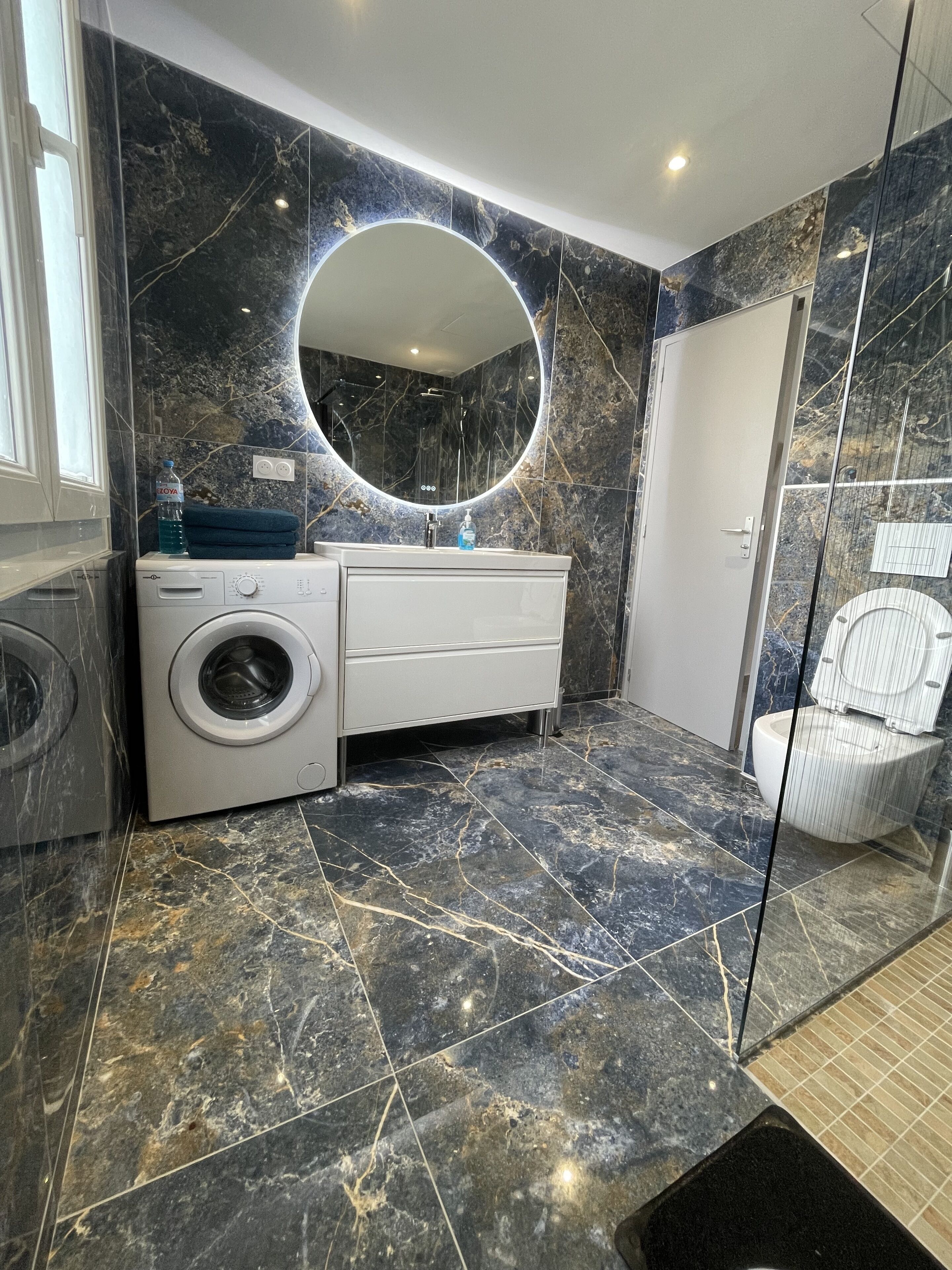 Shower, free toiletries, hair dryer, bathrobes