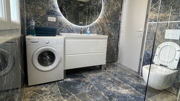 Shower, free toiletries, hair dryer, bathrobes