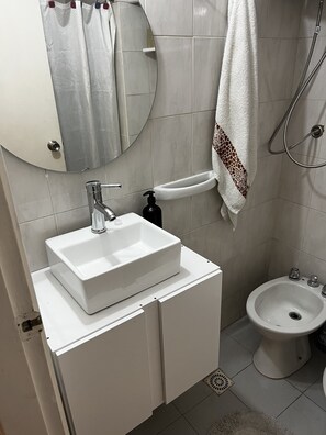 Shower, towels, soap, shampoo