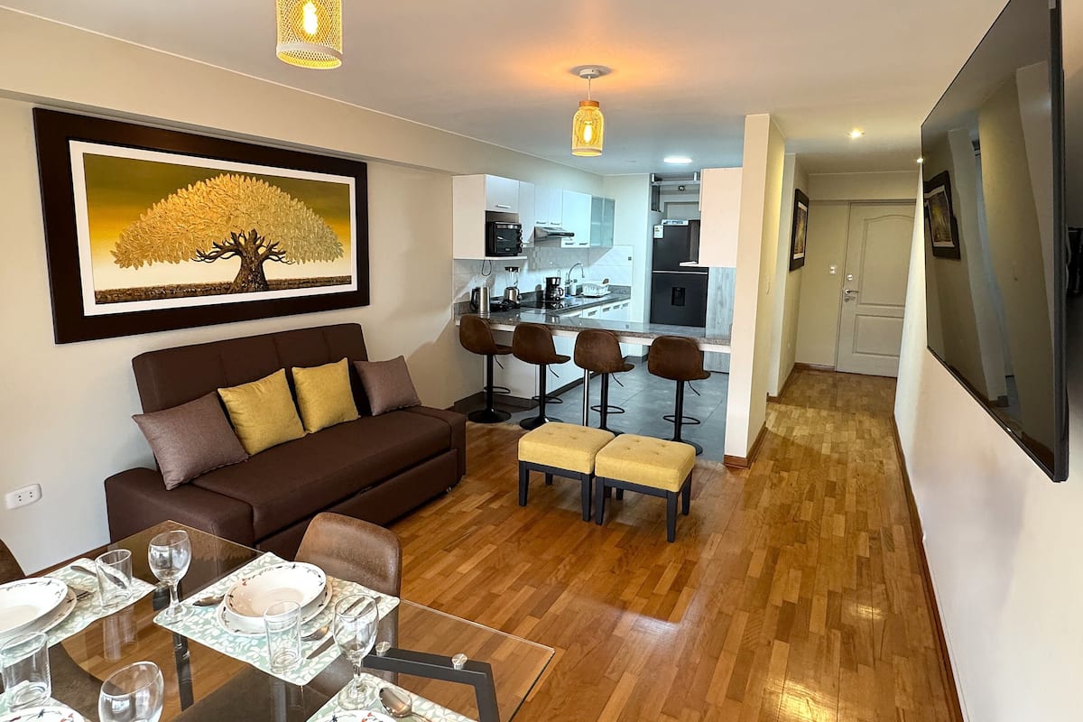 Exclusive Apartment, 1 Queen Bed with Sofa bed, Housekeeping, City View | Living area | 55-inch Smart TV with cable channels