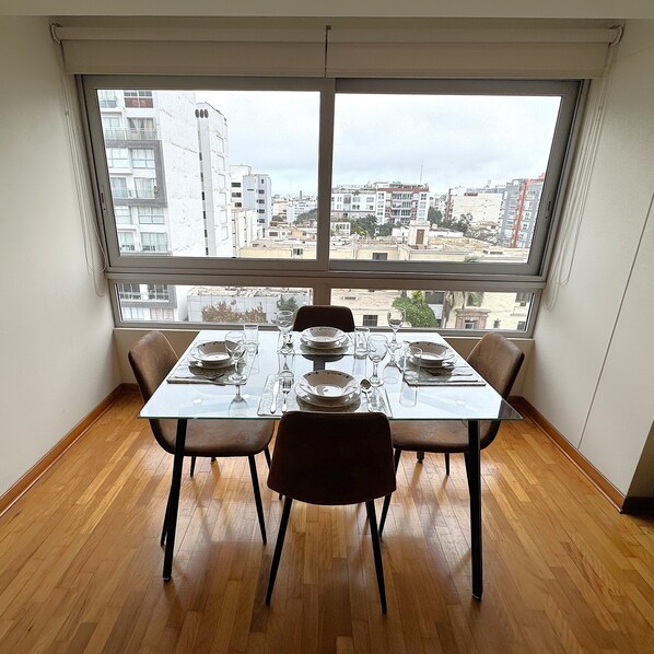Exclusive Apartment, 1 Queen Bed with Sofa bed, Housekeeping, City View | Dining room