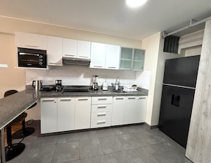 Exclusive Apartment, 1 Queen Bed with Sofa bed, Housekeeping, City View | Private kitchen