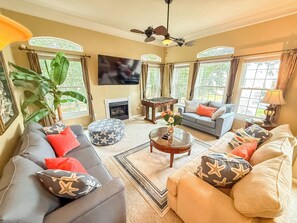 Smart TV, fireplace, foosball, books