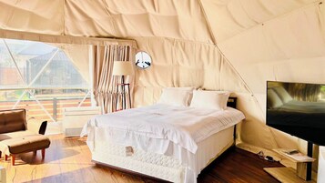 Cabaña ejecutiva | Escritorio, wifi gratis, ropa de cama