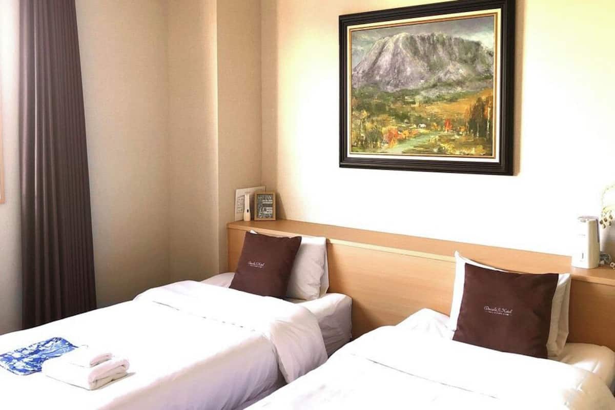 Economy Room, No pets allowed | 1 bedroom, desk, free WiFi, bed sheets