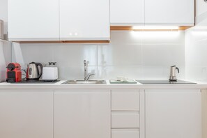 Fridge, microwave, coffee/tea maker, electric kettle