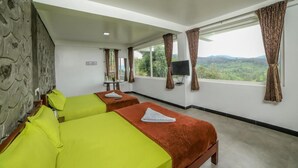 A hotel room with two beds, a television, and a view of the outdoors. - Peri Resorts by Indostays (Kotagiri)