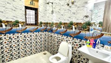 Jetted tub, bidet, towels, soap