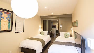 Comfort Twin Room | Living area | 20-inch LCD TV with satellite channels