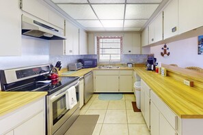 Fridge, microwave, dishwasher, coffee/tea maker - Unique Beach House Experience!  Beachfront Views in the Heart of Madeira Beach. Tickets Included to Top Attractions. (Madeira Beach)