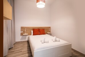 2 dormitorios, tabla de planchar con plancha, wifi gratis y ropa de cama