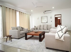 Luxury Apartment | Living area | 32-inch Smart TV with digital channels - Lux Suites Vipingo Luxury Villas (Vipingo)