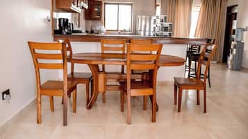 Family Apartment | Private kitchen | Fridge, microwave, cookware/dishes/utensils