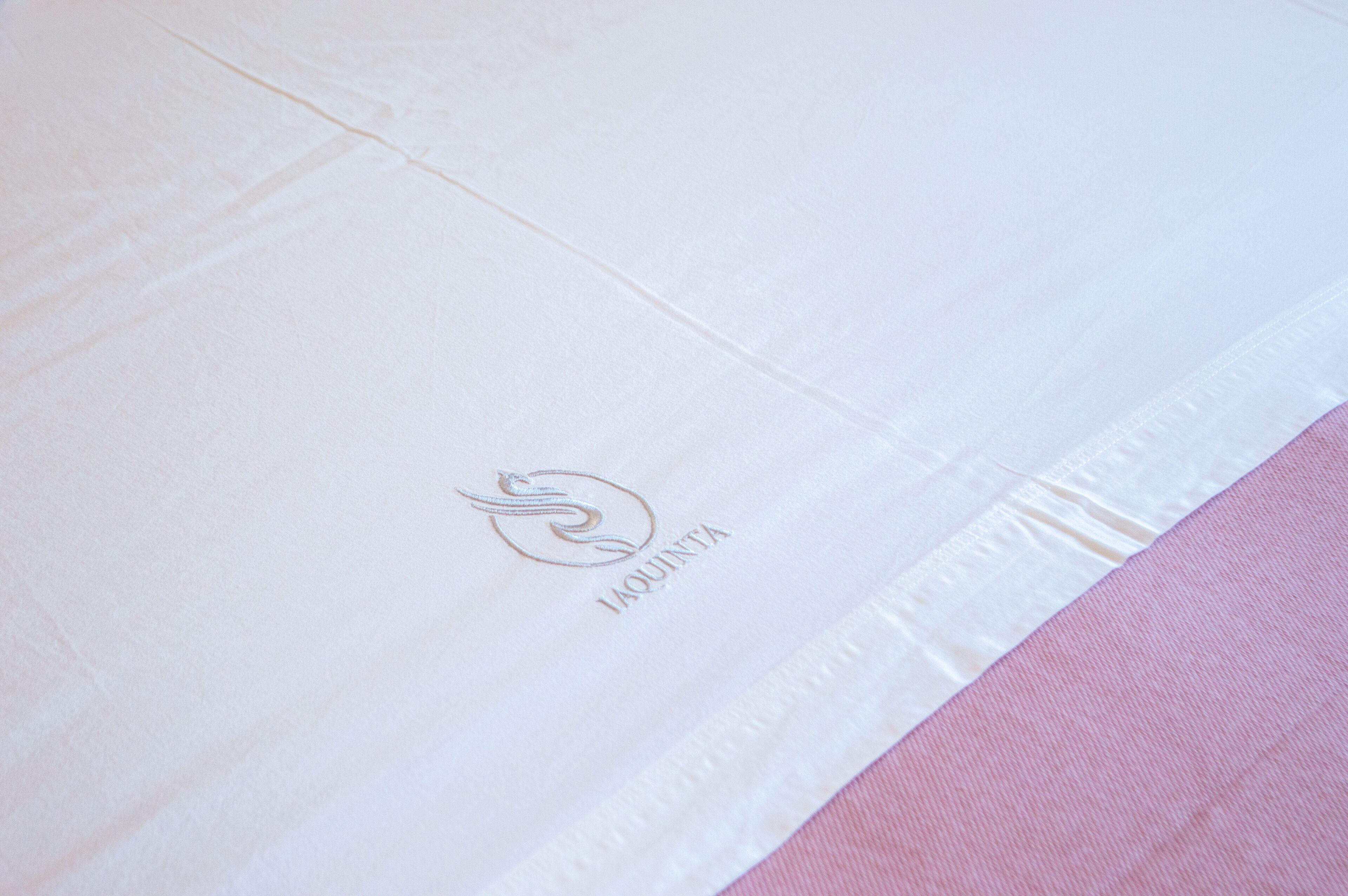 A white envelope with a logo and text.