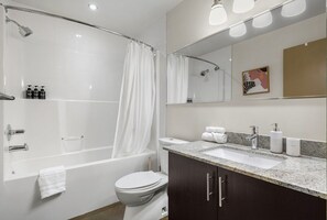 Hair dryer, towels, soap, shampoo