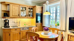 Fridge, oven, coffee/tea maker, toaster