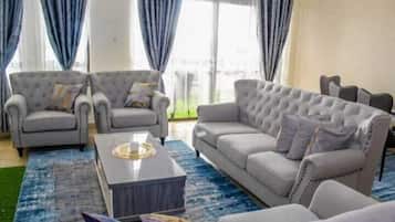 Executive Apartment | Living area | Flat-screen TV